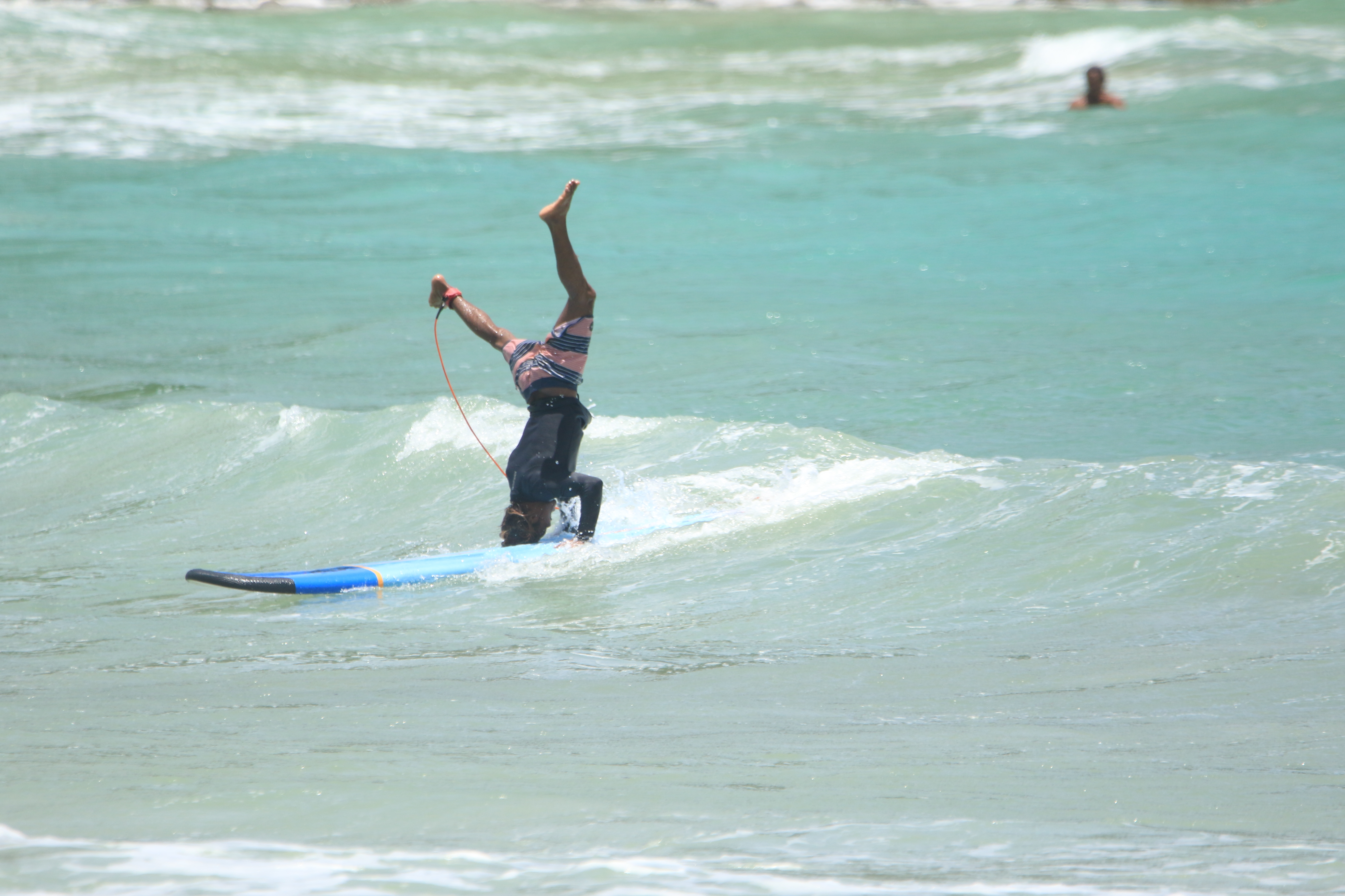 Headstand surfing South Lombok